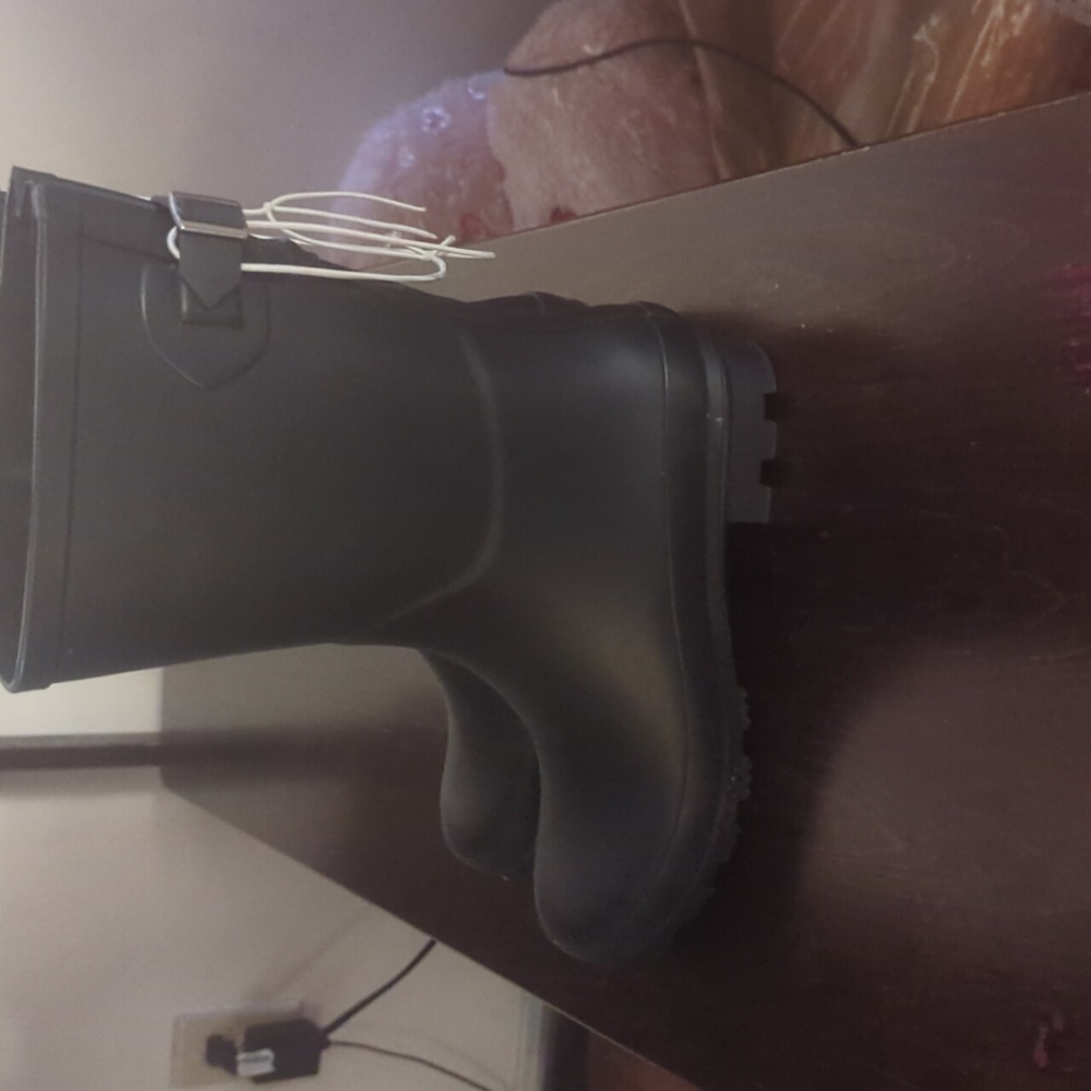 Brand new woman's size 7 Rain boots.